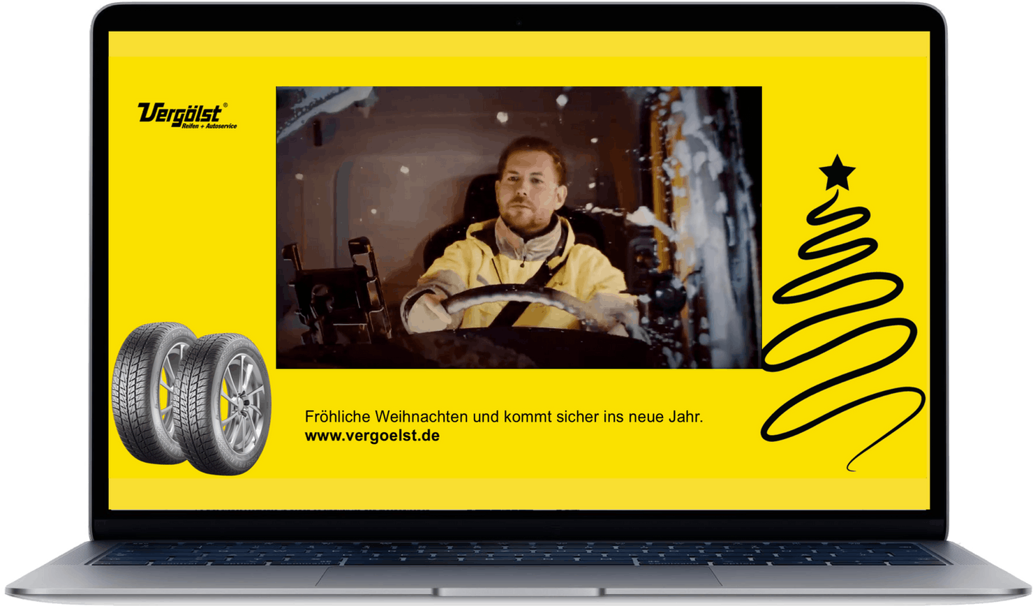 A laptop showing a promotional video from "Vergölst".